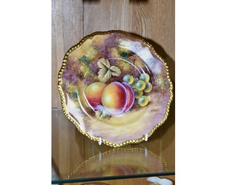 A ROYAL WORCESTER FRUIT STUDY PLATE BY D. SMITH, gilt silver shape and painted with peaches and green grapes on a bank, paint