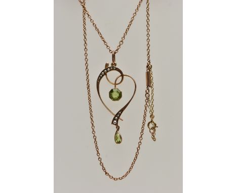 A YELLOW METAL GEM SET LAVALIER PENDANT NECKLACE,  the openwork heart shaped pendant, set with a hexagonal cut peridot with s