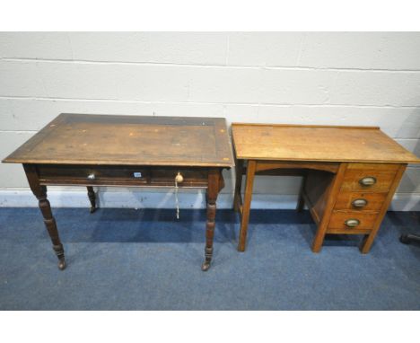 AN EDWARDIAN OAK WRITING DESK, with a hinged back enclosing a rising desk organiser, two frieze drawers, on turned legs, widt