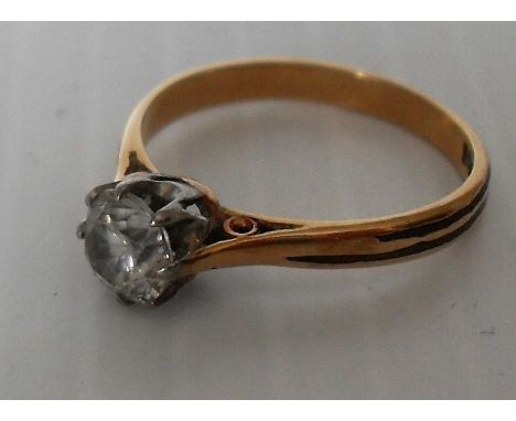 An 18ct yellow gold brilliant-cut solitaire diamond ring in a claw setting, approximately 0.5 carat using spread gauge. Gross