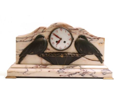 An Art Deco French marble mantel clock, c.1930, with an enamel dial with painted Arabic numerals, the front mounted with a pa