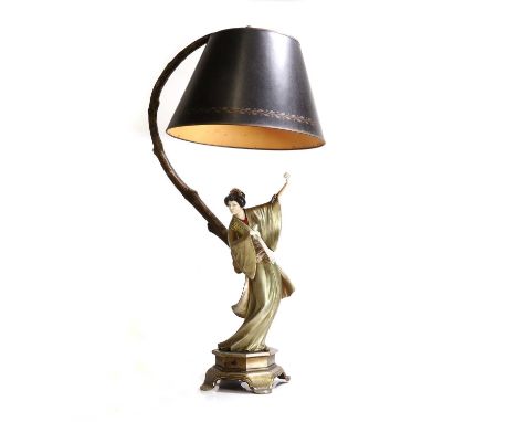 ▲ Hans Harders (German, 1875-1955), 'The Fan Dancer', c.1925, a cold-painted bronze and ivory figural table lamp, modelled as