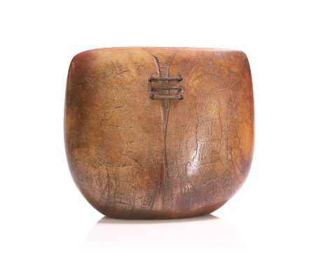▲ Peter Hayes (b.1946), a raku studio pottery sculpture, c.1991, of bow form in brown and orange tones, incised marks through
