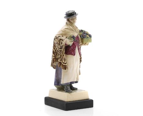 ▲ Charles Vyse (1882-1971), c.1926, a Chelsea Pottery figure of 'The Shawl', on an ebonised plinth,30cm highLiterature: Refer