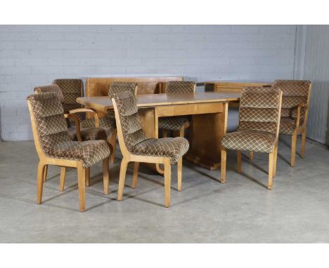 An Art Deco burr maple dining suite, comprising:a dining table, with an extra with leaf,137cm wide, 200cm extended76cm high, 