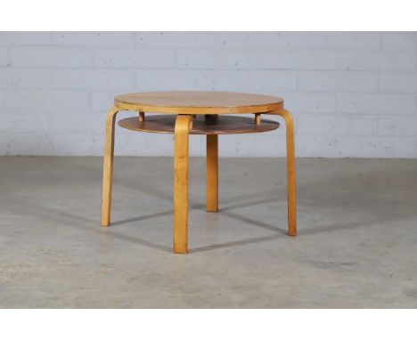 Alvar Aalto (Finnish, 1898-1976), a 'Model 70' coffee table, originally designed in 1933, the circular birch top over an unde