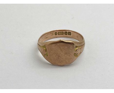 A 9ct Rose Gold Signet Style Ring, with vacant shield panel (finger size U / shank bent) (5.5grams).