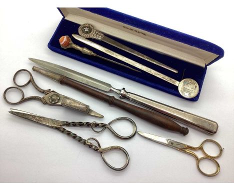 Leonore Doskow; A Modern Letter Opener, with disc finial, initialled 'EW'; together with further letter openers, a pair of mo