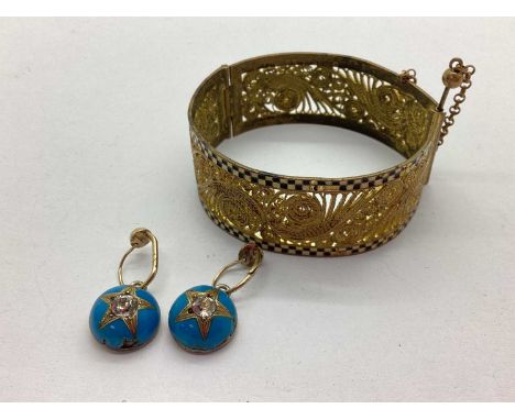 A Pair of Victorian Turquoise Enamel Earrings, on hinged hook fittings (odd); a vintage gilt metal filigree and enamel wide b
