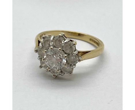 A 9ct Gold Flowerhead Cluster Ring, claw set throughout, to tapered shoulders, (finger size N 1/2), (3.3grams).