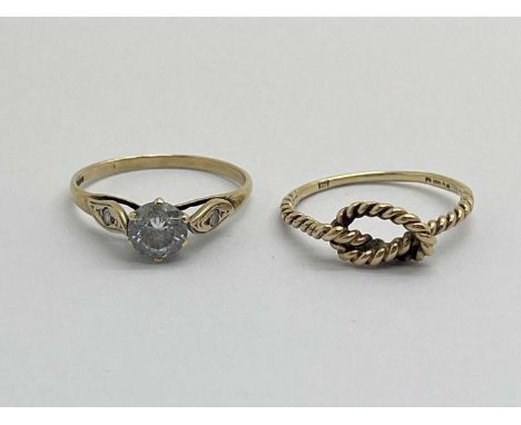 A 9ct Gold Single Stone Dress Ring, claw set, between inset fancy shoulders (finger size P), a 9ct gold textured knot style r