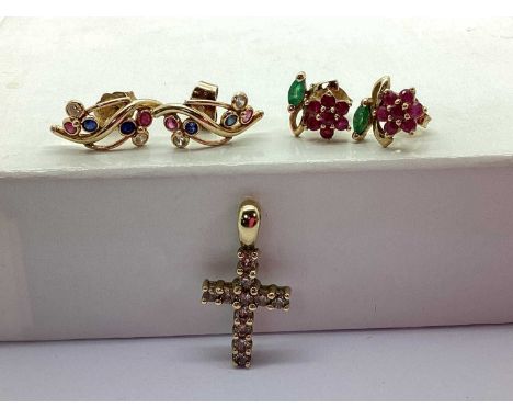 A Diamond Set Cross Pendant, stamped "375", together with a pair of ruby and emerald set earrings, of flowerhead design, stam