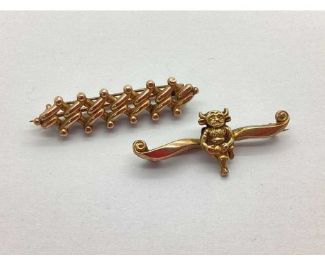 A Vintage Lincoln Imp Souvenir Bar Brooch, stamped "9ct Gold"; together with a fancy curb link style bar brooch. (2)
