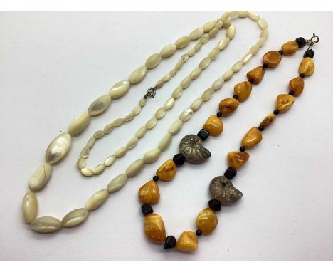 An Amber Coloured Single Strand Bead Necklace, with graduated bead and ammonite spacers; together with a vintage mother of pe
