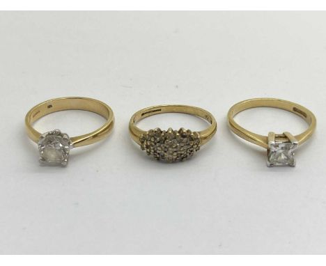 A 9ct Gold Round Single Stone Ring, together with another 9ct gold ring of a similar style, 9ct gold diamond set cluster ring