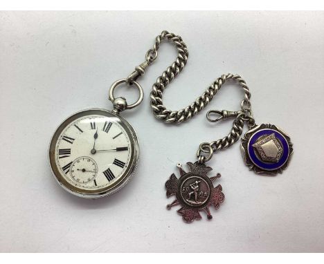 A Vintage Openface Pocket Watch, the white dial with black Roman numerals and seconds subsidiary dial, the movement cover eng