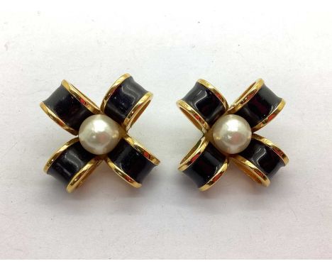 Chanel; A Pair of Black Enamel and Imitation Pearl Bow Clip on Earrings.Yes hinges work as normal and sit flush to the earrin