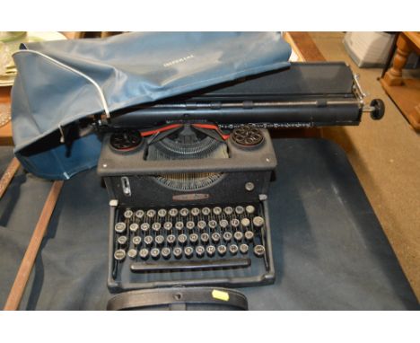 An Imperial typewriter with cover