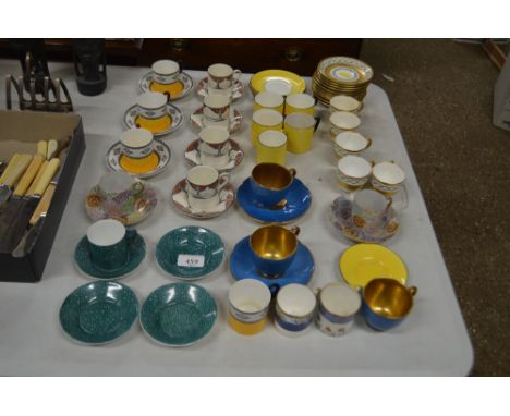 A quantity of various coffee cups and saucers 