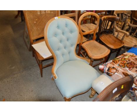 A modern button back nursing chair 