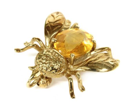 A 9ct gold bee brooch/pendant, the body claw set with an oval mixed cut citrine, to pin and roller catch, and concealed penda