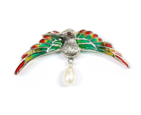 A silver plique-à-jour enamel brooch/pendant, in the form of a bird, with green, yellow and red plique-à-jour enamel wings, a