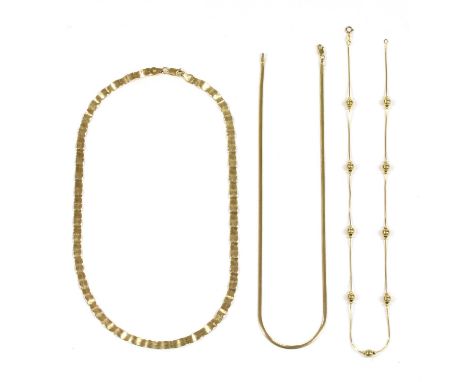 A 9ct gold undulating herringbone link chain, with side lever clasp, Sheffield, 465mm long, together with a 9ct gold flattene