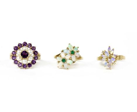 Three 9ct gold rings, to include an amethyst and split pearl target cluster ring, head 18.5mm wide, Birmingham 2000, an opal 