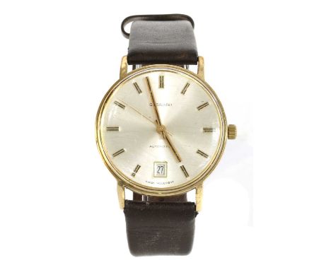 A gentlemen's 9ct gold Garrard automatic strap watch, c.1980, 34mm diameter, with a silvered dial, baton hour markers, centre