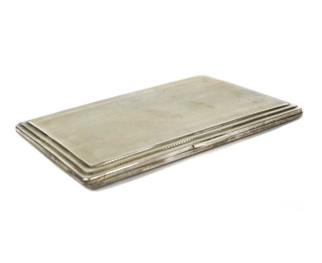 A sterling silver cigarette case, by W T Toghill &amp; Co, of rectangular form with engine turned decoration, Birmingham 1948