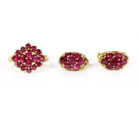 A 9ct gold ruby and diamond cluster ring, a cluster of round, oval and pear cut rubies, with brilliant cut diamonds to the sh