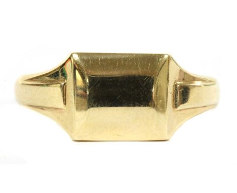 A 9ct gold signet ring, by Henry Griffith &amp; Sons, a slightly domed rectangular head, approximately 9.5 x 11.5mm, to taper