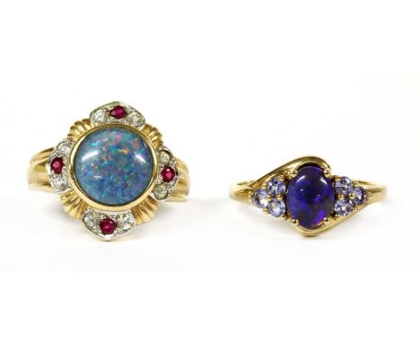 Two 9ct gold rings, to include a synthetic opal triplet, ruby and paste ring, import hallmark Birmingham 1998, and an opal an