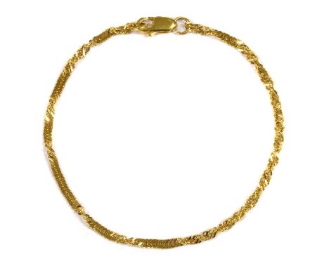 A 22ct gold twisted curb link bracelet, with side lever clasp, Birmingham 2000, 185mm long, 3.17gCondition report: A break in