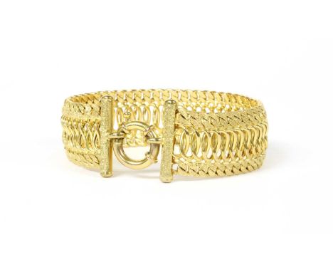 A 9ct gold bracelet, plain polished oval links to the centre, with stippled curb link guards, stippled end bars and jumbo bol