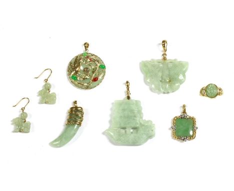 A quantity of gold jade jewellery, to include a carved jade junk pendant, with gold clip bale, tested as approximately 14ct g