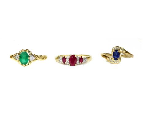 Three 9ct gold rings, to include a ruby and diamond ring, Birmingham 2002, an emerald and diamond ring, Birmingham 2000, and 