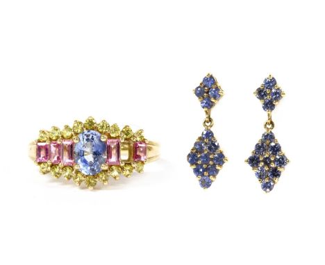 A pair of 9ct gold sapphire cluster earrings, circular mixed cut sapphires, claw set to a lozenge, surmounted with a quatrefo