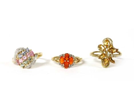 Three 9ct gold rings, to include a sapphire, pink sapphire, green sapphire and diamond ring, Birmingham 2004, a fire opal and