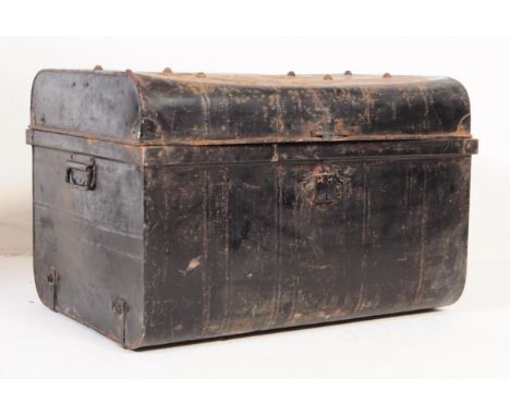 A vintage early 20th century painted metal steamer trunk chest. The chest painted in a black colourway, with riveted construc