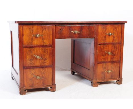 A 19th century Victorian twin pedestal writing office desk. Having a rectangular top with green leather inset with gilt bandi