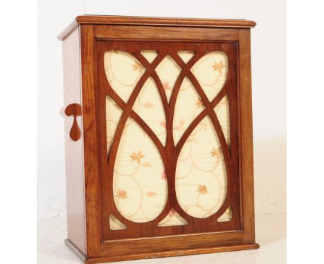 An early 20th century 1930s Art Deco style mahogany laundry basket bin. Of rectangular form with an Art Deco carved geometric