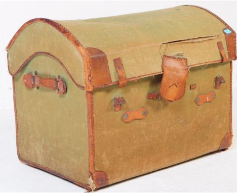 A 19th century Victorian green canvas bound wooden steamer trunk chest with dome top. Leather handles to the sides with leath