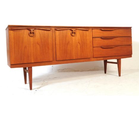 Beautility - A mid 20th century teak wood Beautility sideboard credenza / drinks cabinet. The sideboard of rectangular form w