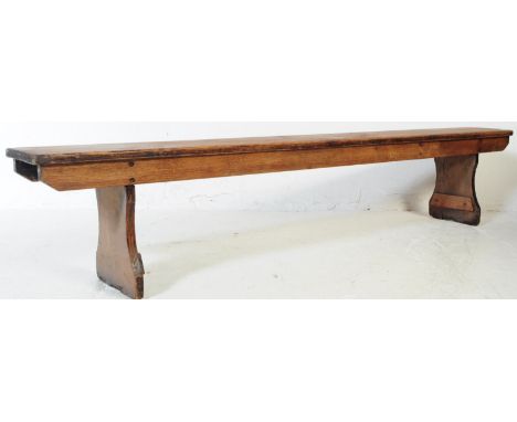 A 19th century Victorian oak refectory pig bench / pew settle. Of long rectangular form with upright supports. Measures appro