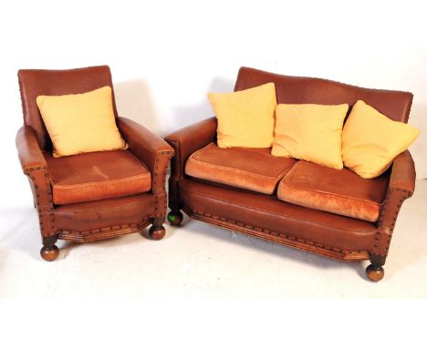 Vintage 20th century Art Deco 1930s faux leather armchair together with matching sofa settee. Measures approx. Brown colourwa