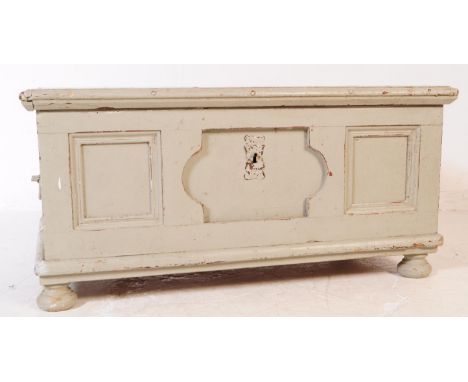 A 19th century French painted pint blanket box / trunk. The trunk raised on bun feet, with hinged lid. Having bevelled inset 