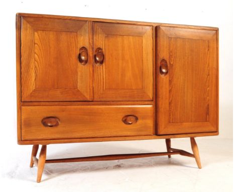 Ercol Furniture - British Modern Design - Mid 20th century circa 1960s blonde beech and elm sideboard. Model 467. Rectangular