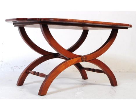 A 20th century butlers / tray table. Constructed from burr walnut wood with brass hinges to raise and elevate sides.&nbsp;The