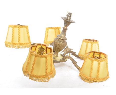A 20th century 1940s Dutch style gilt brass five branch chandelier / light fitting. Having five scrolling branches extending 